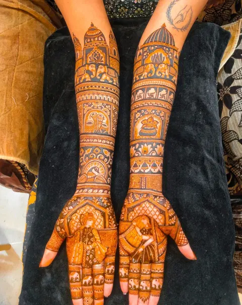 figure full hand mehndi design