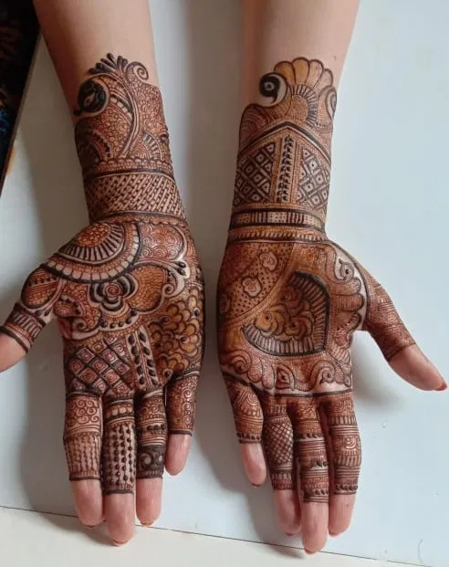 Front Hand Mehndi Design with Figures and Hearts