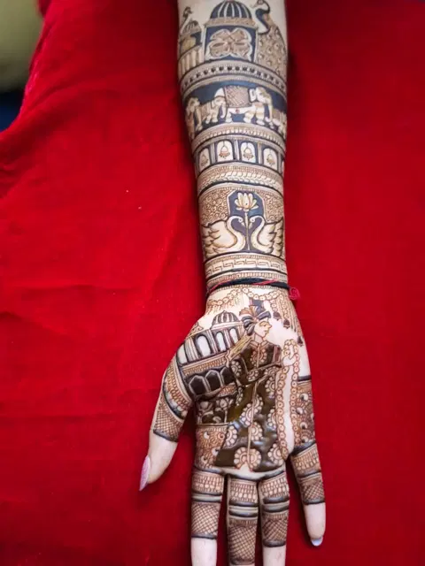 bridal deity full hand mehndi design