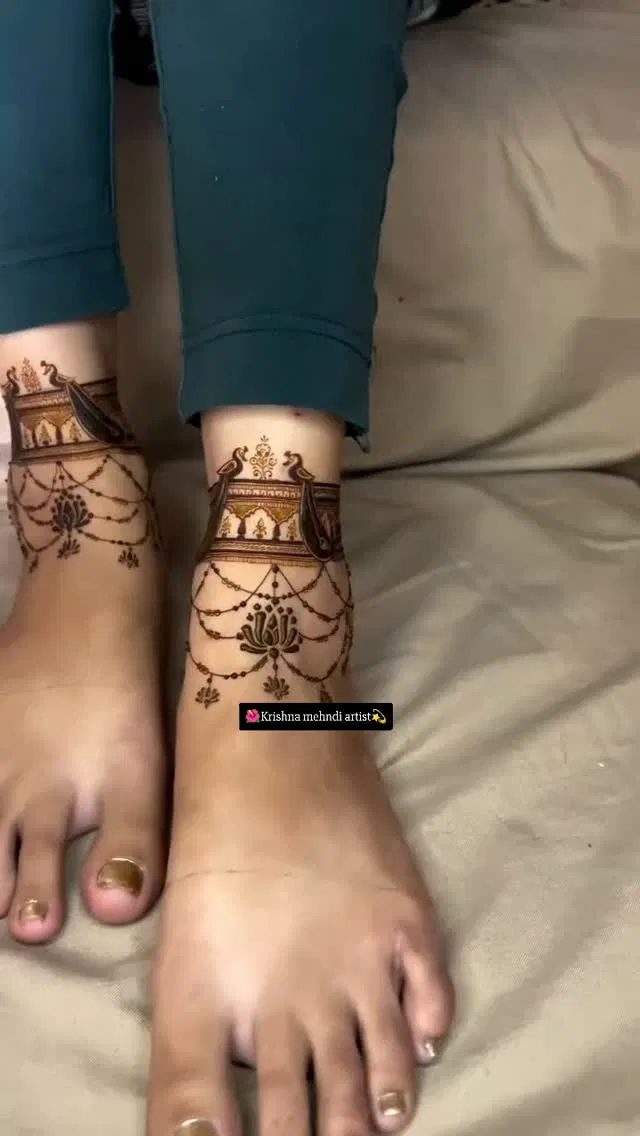 Bridal Back Hand Mehndi Design with Deity