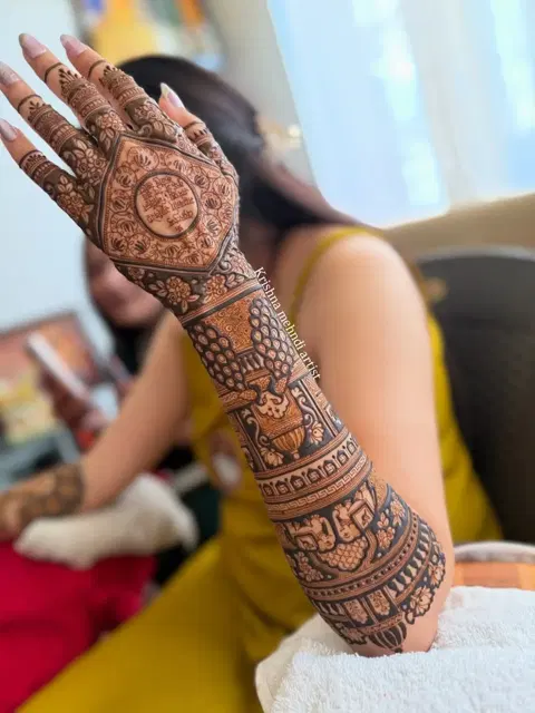 bridal deity back hand mehndi design