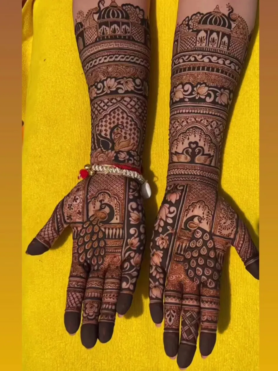 Bridal Mehndi Design with Figures and Peacock
