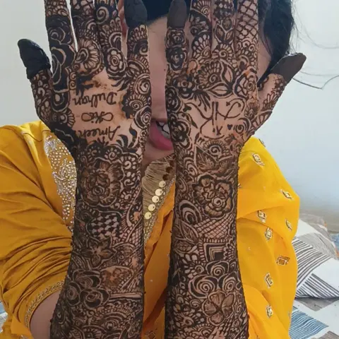figure full hand mehndi design