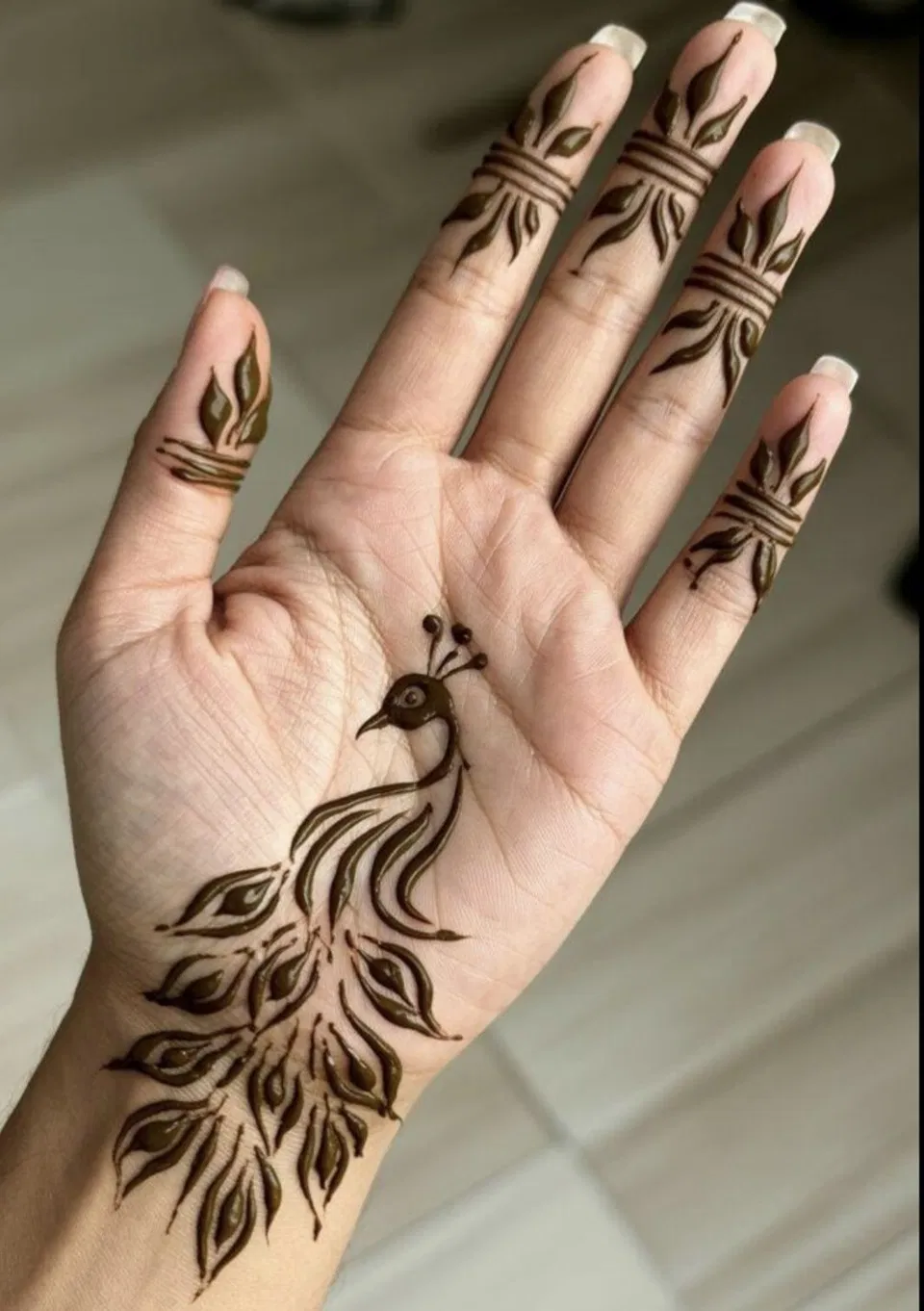 Aesthetic Minimal Front Hand Mehndi Design with Peacock