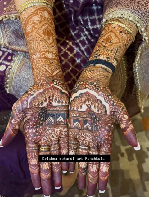 bridal back hand mehndi design