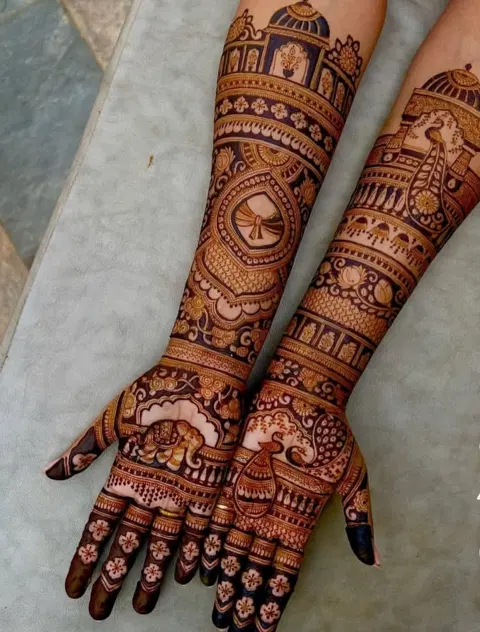 figure full hand mehndi design