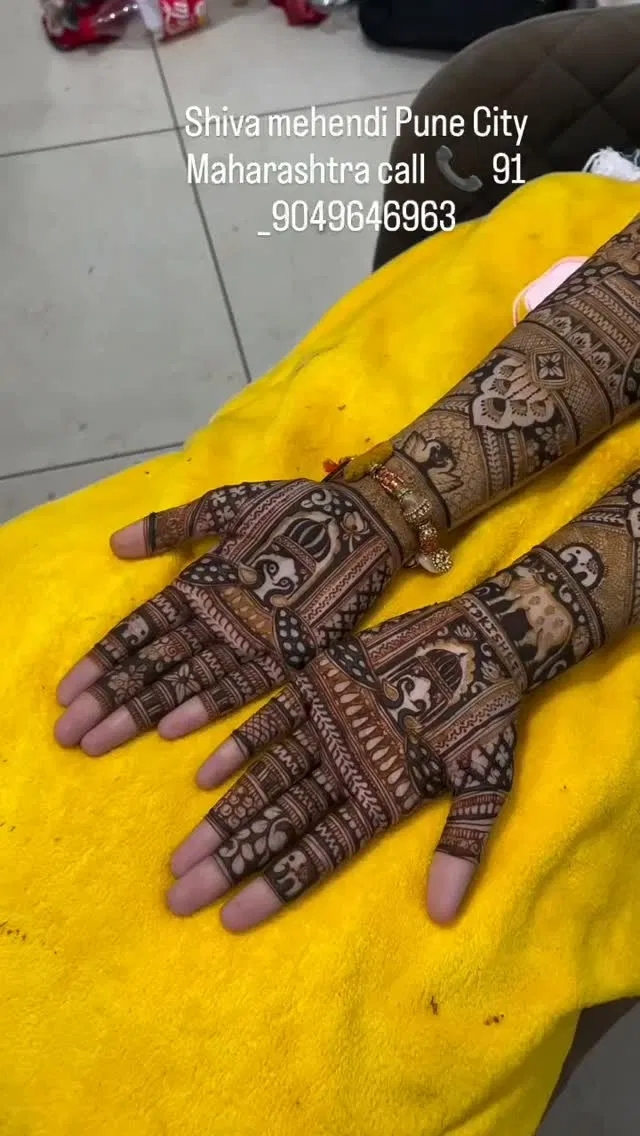 Bridal Back Hand Mehndi Design with Figures