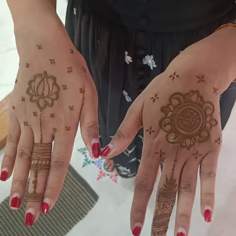 bridal lotus back hand mehndi design
