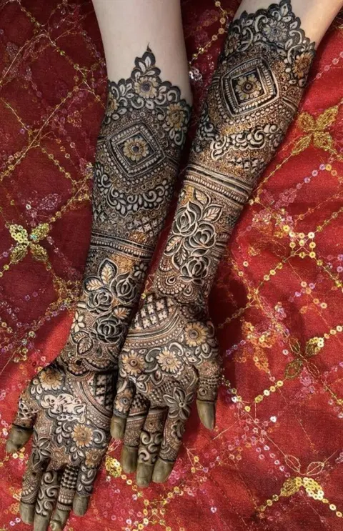 bridal indian figure arm mehndi design