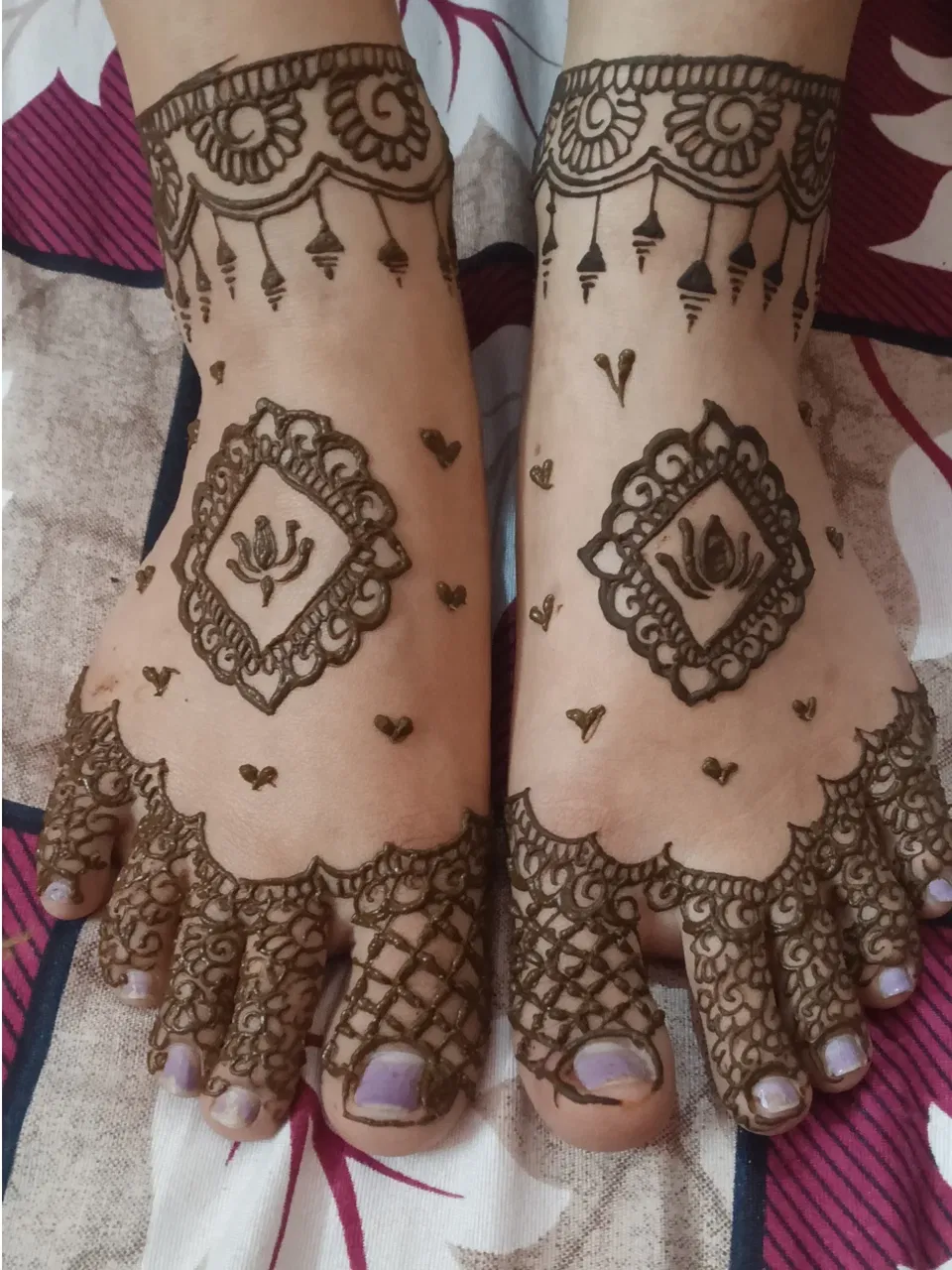 Foot Mehndi Design with Hearts and Lotus