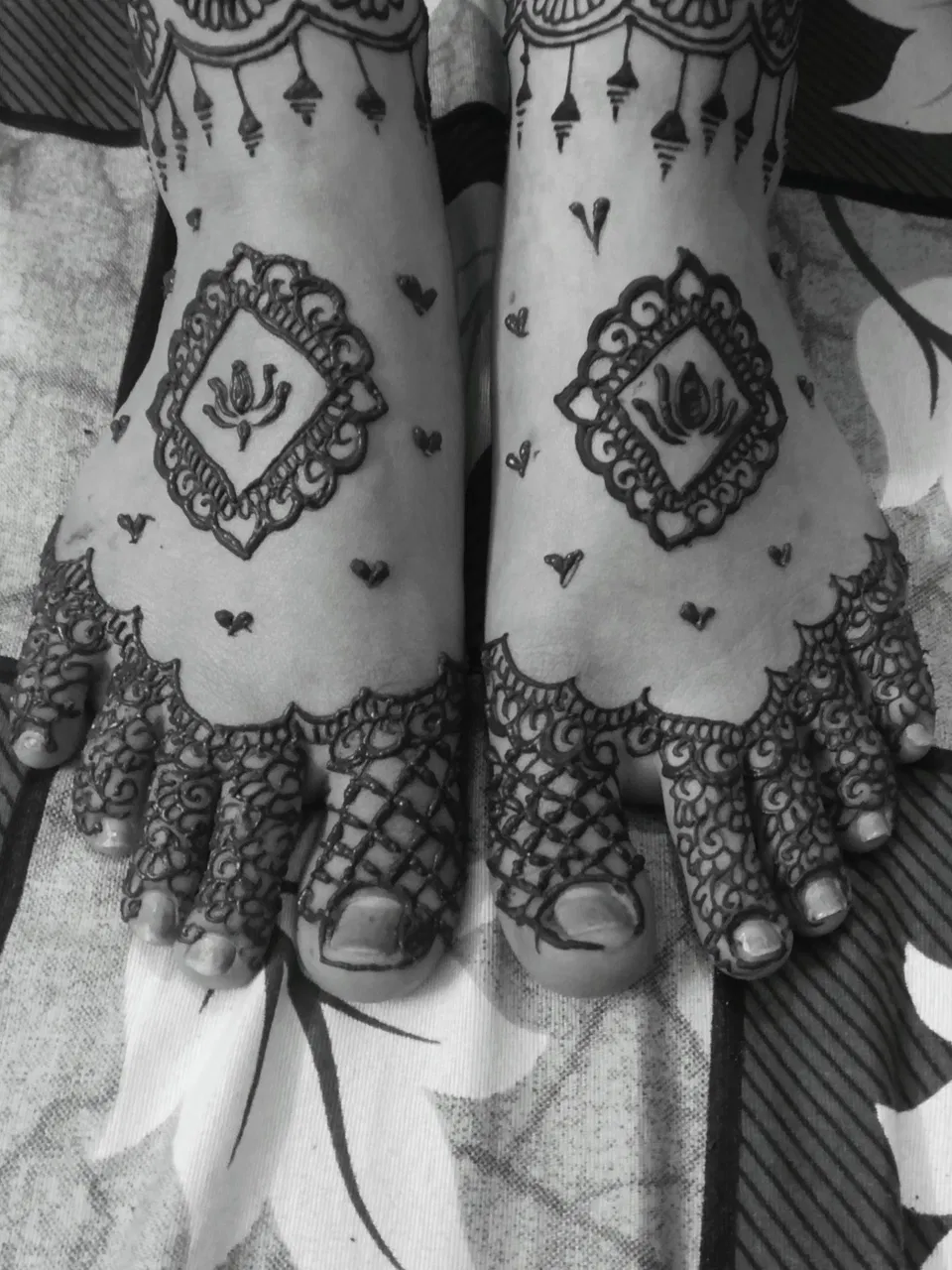 Back Hand Mehndi Design with Figures, Hearts and Lotus for Engagement (3)