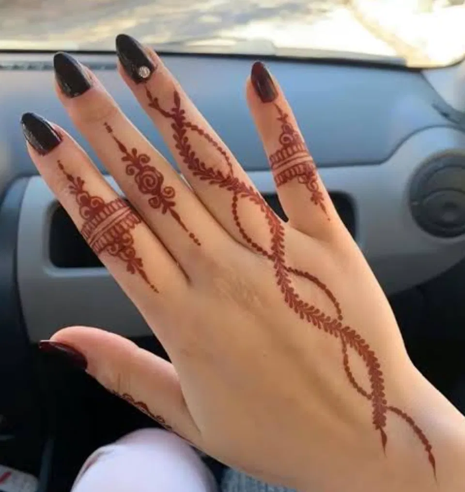 Arabic Minimal Back Hand Mehndi Design with Jaal