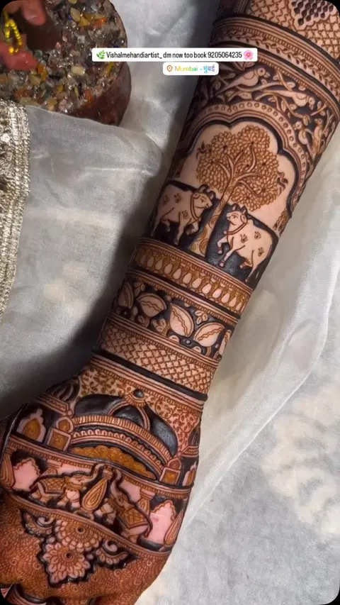 bridal indian figure back hand mehndi design