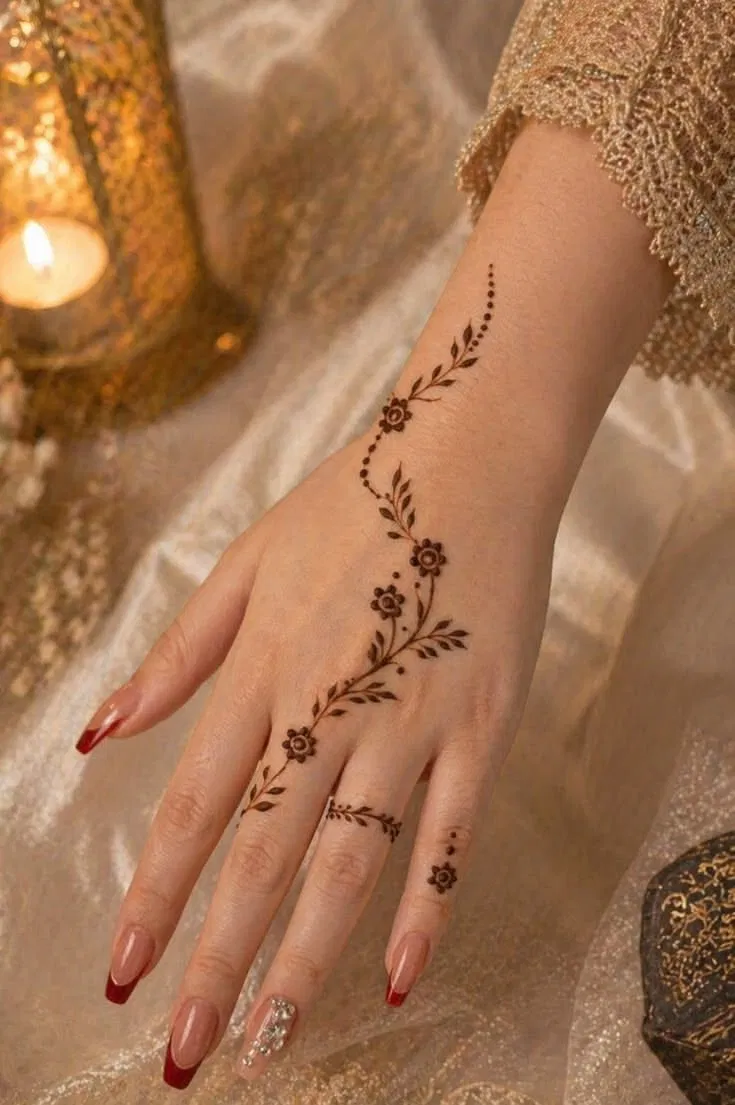 Aesthetic Arabic Back Hand Mehndi Design with Bel and Jaal