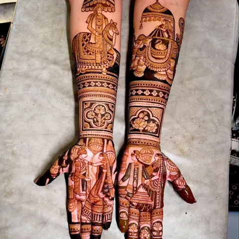 figure full hand mehndi design