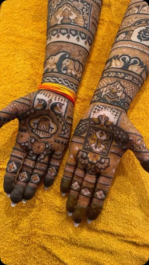 bridal back hand mehndi design