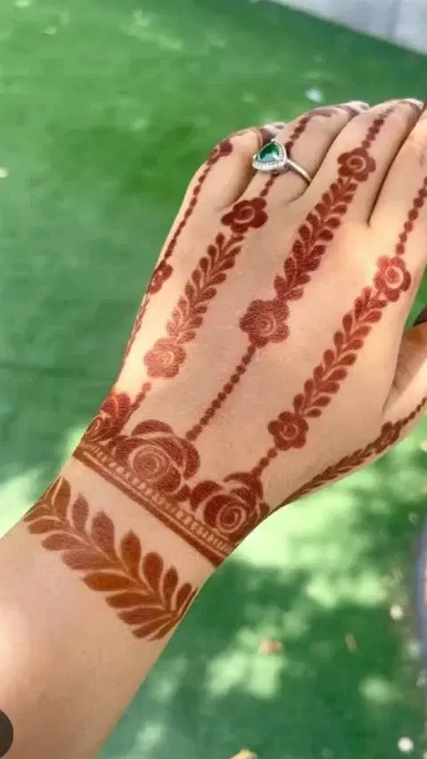 aesthetic arabic flower back hand mehndi design