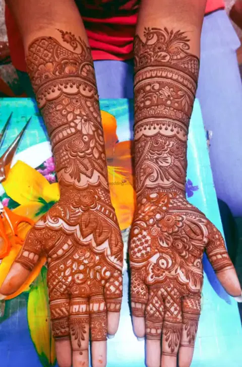 figure full hand mehndi design