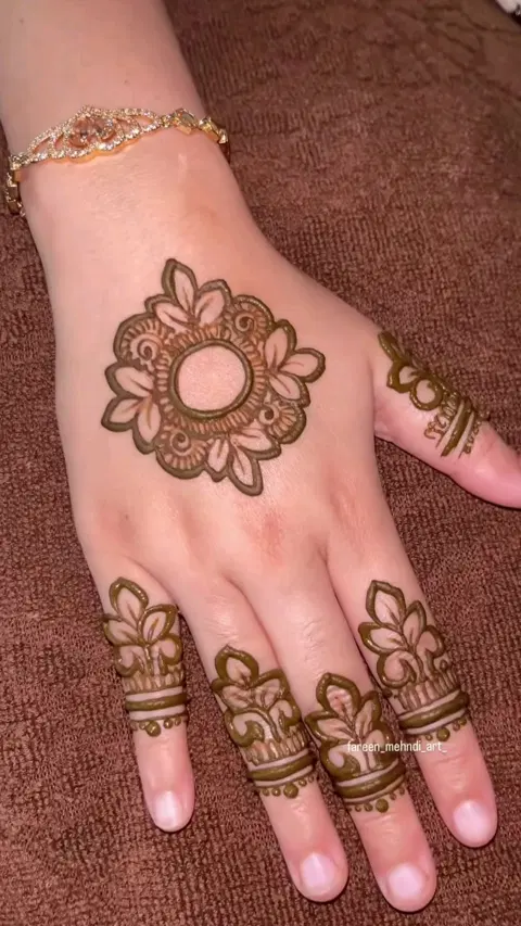 aesthetic arabic bel back hand mehndi design