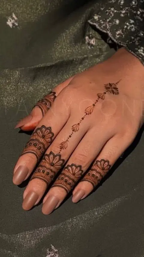 minimal simple lotus back hand mehndi design