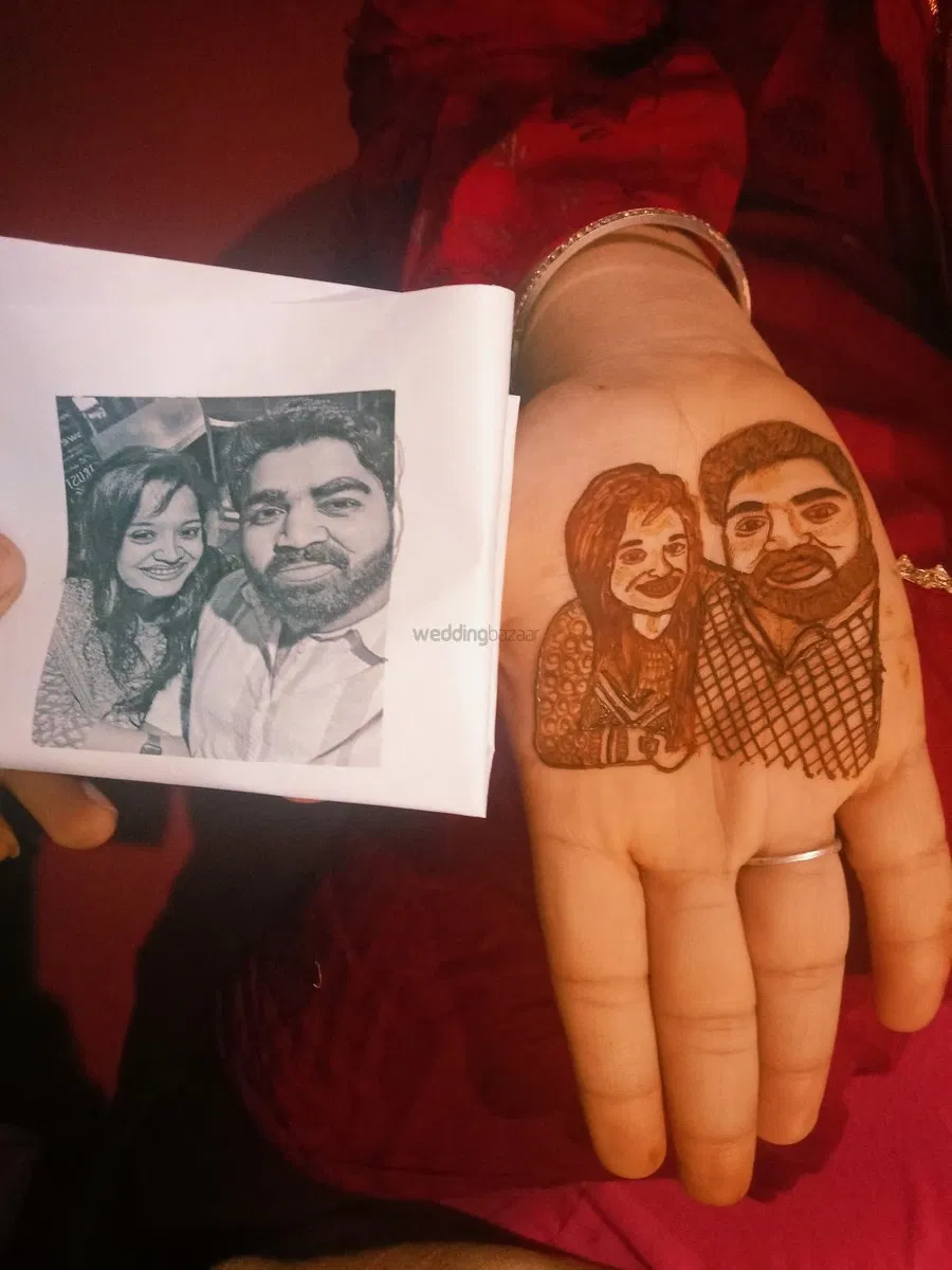 Back Hand Mehndi Design with Figures