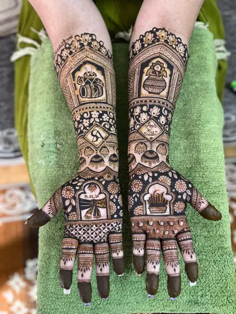 figure full hand mehndi design