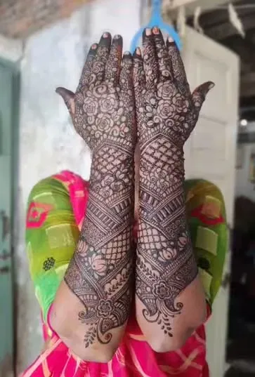 Back Hand Mehndi Design with Figures