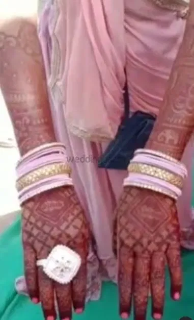 Back Hand Mehndi Design with Figures (2)