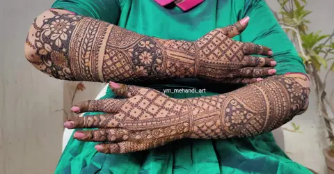 figure back hand mehndi design