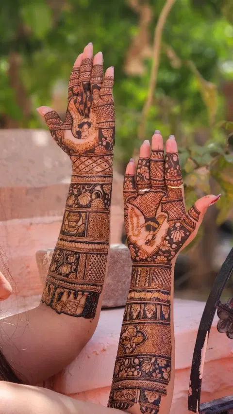 figure full hand mehndi design