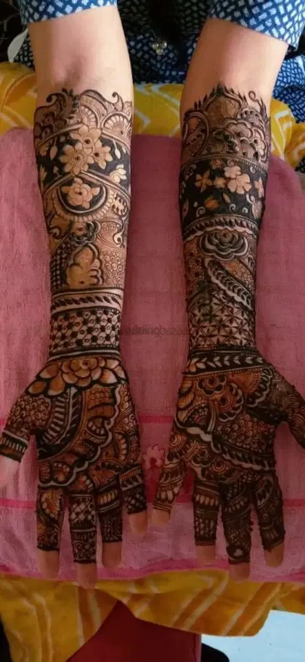 figure full hand mehndi design