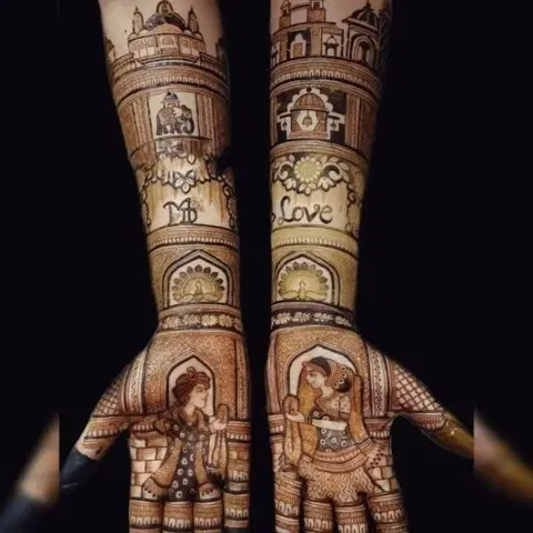 figure front hand mehndi design