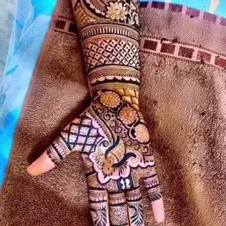 Back Hand Mehndi Design with Figures