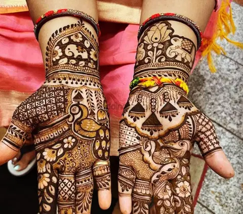 figure full hand mehndi design