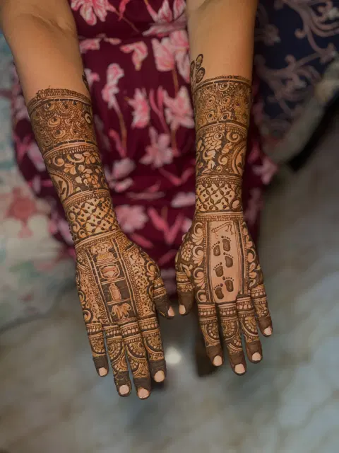 figure full hand mehndi design