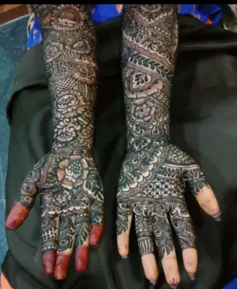 figure full hand mehndi design