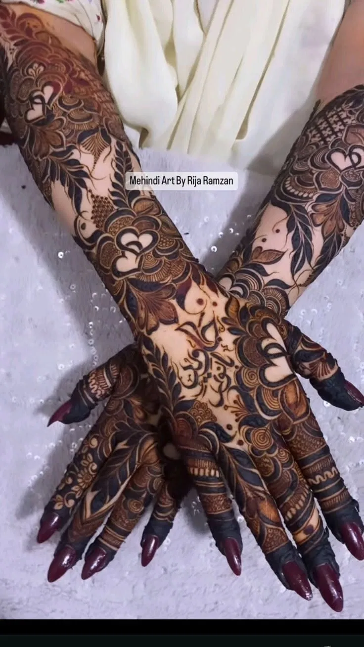 Aesthetic Bridal Back Hand Mehndi Design with Flowers and Hearts for Eid