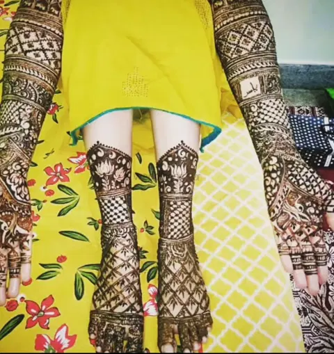 figure full hand mehndi design