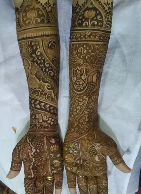 figure full hand mehndi design