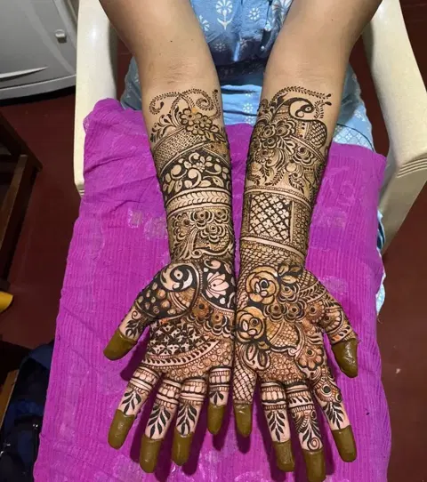 figure full hand mehndi design