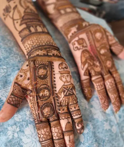 figure front hand mehndi design