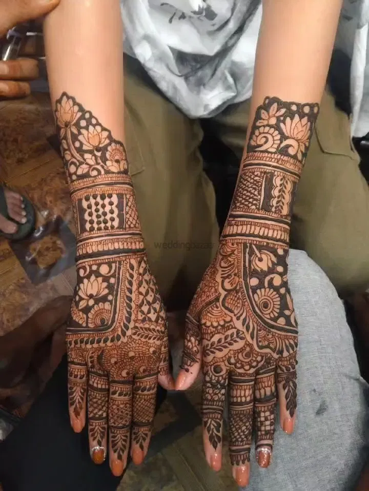 Back Hand Mehndi Design with Figures