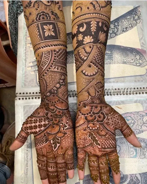 figure full hand mehndi design