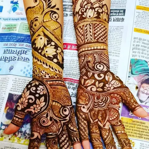 figure full hand mehndi design
