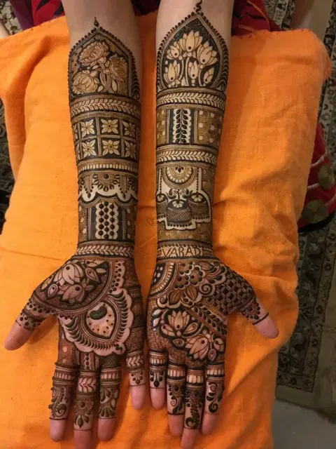 figure full hand mehndi design