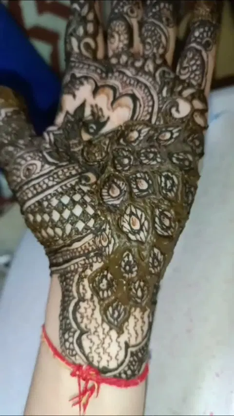 peacock front hand mehndi design