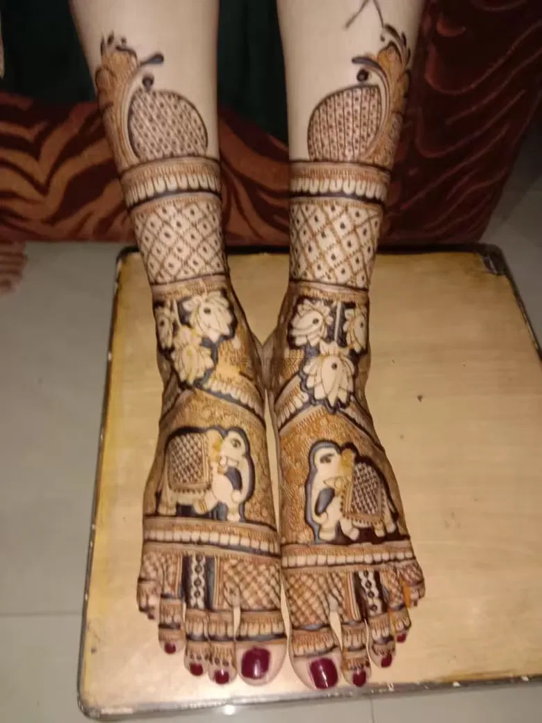 Foot Mehndi Design with Figures and Peacock