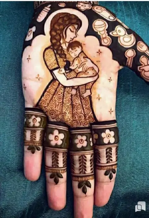 figure back hand mehndi design