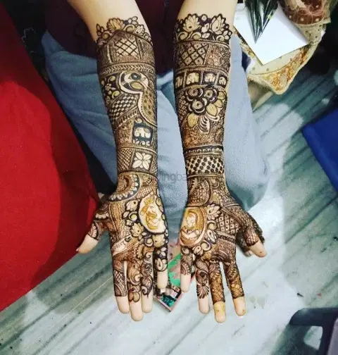 figure full hand mehndi design