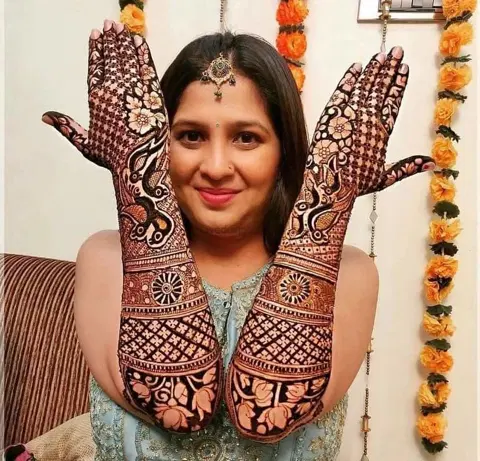figure full hand mehndi design